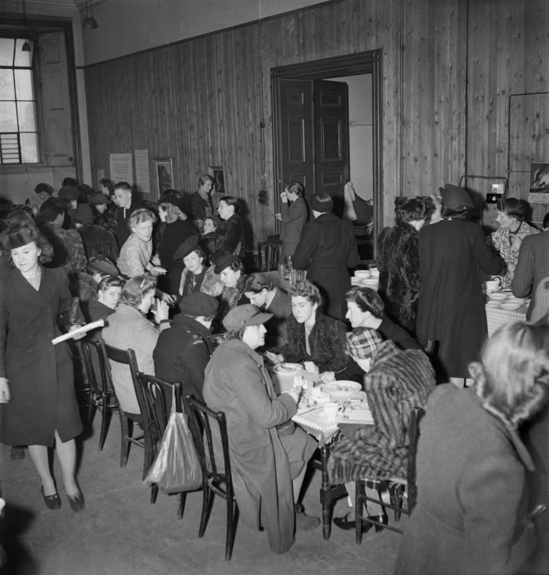 London canteen with people sharing a meal